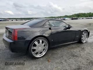 ✅ 2006 Cadillac XLR • VIN: 1G6YV36A265600782 • Лот: 54352705. Опубликован ранее на Copart с пробегом 94 678 миль. Бесплатный доступ к архиву аукционных продаж из США и подробный отчёт об истории автомобиля на DreamBid. Изображение 3.