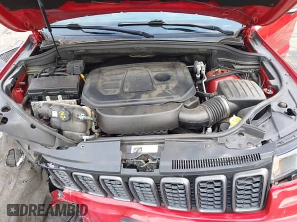 2021 Jeep Grand Cherokee Trailhawk with VIN 1C4RJFLGXMC579888, listed as a IAAI auction lot 42951354 with 76,948 mi miles and . Bid and sale history available at DreamBid. Image 10.