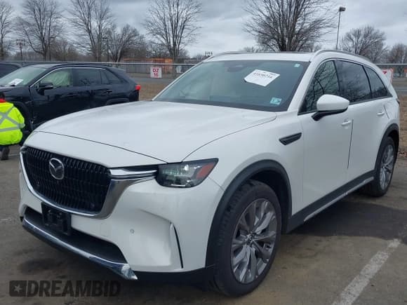 ✅ 2024 Mazda CX-90 Premium Plus • VIN: JM3KKEHDXR1170758 • Лот: 41650216. Опубликован ранее на IAAI с пробегом 5 933 миль. Бесплатный доступ к архиву аукционных продаж из США и подробный отчёт об истории автомобиля на DreamBid. Изображение 2.