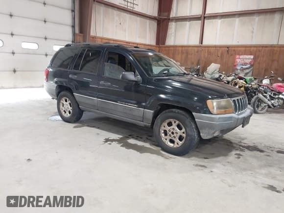 ✅ 2001 Jeep Grand Cherokee Laredo • VIN: 1J4GW48SX1C691946 • Lot: 42468388. Listed on IAAI with 162,310 mi. Free auction sales archive from the USA and detailed vehicle history report at DreamBid. Image 1.