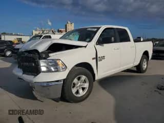 2021 Ram 1500 SLT с VIN 1C6RR6TT5MS516202, выставлен на аукционе Copart как лот 87386524 с пробегом 123 711 миль миль и Списание • Salvage title. История ставок и продаж доступна на DreamBid. Изображение 1.