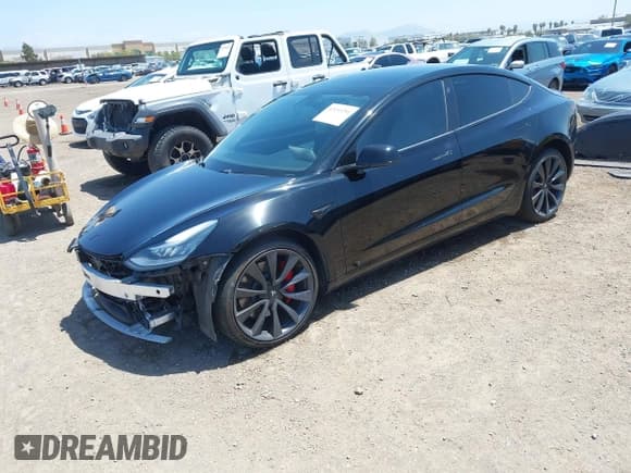 ✅ 2020 Tesla Model 3 Performance • VIN: 5YJ3E1EC5LF641593 • Lot: 42153291. Listed on IAAI with 70,264 mi. Free auction sales archive from the USA and detailed vehicle history report at DreamBid. Image 20.