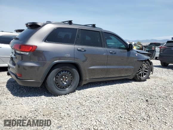 2019 Jeep Grand Cherokee Trailhawk с VIN 1C4RJFLT0KC662093, выставлен на аукционе Copart как лот 65987125 с пробегом Не указан миль и Списание • Salvage title. История ставок и продаж доступна на DreamBid. Изображение 3.