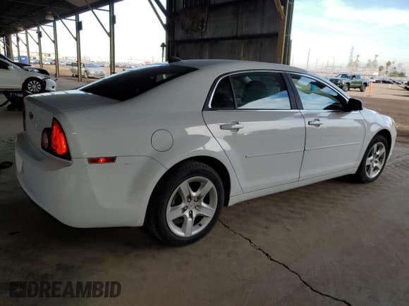 ✅ 2012 Chevrolet Malibu 1LS • VIN: 1G1ZB5E07CF246867 • Lot: 85385894. Listed on Copart with 210,783 mi. Free auction sales archive from the USA and detailed vehicle history report at DreamBid. Image 3.