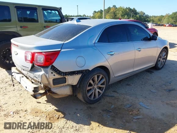 ✅ 2014 Chevrolet Malibu LTZ • VIN: 1G11H5SL6EF117001 • Lot: 43325344. Listed on IAAI with 183,202 mi. Free auction sales archive from the USA and detailed vehicle history report at DreamBid. Image 4.