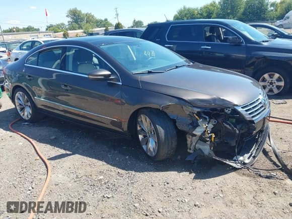 ✅ 2013 Volkswagen CC Executive • VIN: WVWGU7AN0DE555948 • Лот: 43101933. Опубликован ранее на IAAI с пробегом 184 060 миль. Бесплатный доступ к архиву аукционных продаж из США и подробный отчёт об истории автомобиля на DreamBid. Изображение 1.