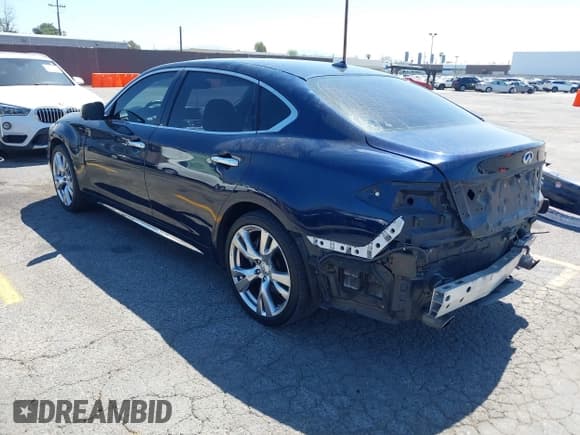 ✅ 2015 Infiniti Q70 • VIN: JN1BY1PP8FM601834 • Lot: 42028330. Listed on IAAI with 106,285 mi. Free auction sales archive from the USA and detailed vehicle history report at DreamBid. Image 3.