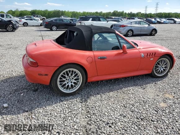 ✅ 2000 BMW Z3 • VIN: WBACH3346YLF71668 • Lot: 54133775. Listed on Copart with 147,065 mi. Free auction sales archive from the USA and detailed vehicle history report at DreamBid. Image 3.