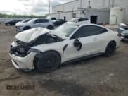 ✅ 2022 BMW M4 • VIN: WBS53AZ05NCH86997 • Lot: 65124395. Listed on Copart with 69,657 mi. Free auction sales archive from the USA and detailed vehicle history report at DreamBid. Image 1.