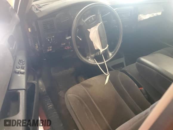 2001 Dodge Dakota Sport z VIN 1B7GG26N31S197440, wystawiony jako Copart lot #68280665 z przebiegiem Nie podano mil oraz Szkoda całkowita • Salvage title. Historia ofert i sprzedaży dostępna na DreamBid. Obrazek 8.