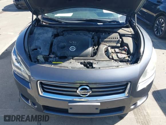 2012 Nissan Maxima S z VIN 1N4AA5APXCC821884, wystawiony jako IAAI lot #41640474 z przebiegiem 185 732 mil mil oraz . Historia ofert i sprzedaży dostępna na DreamBid. Obrazek 10.