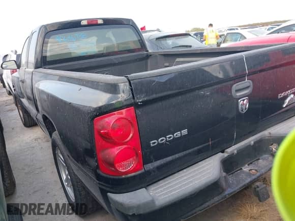 2010 Dodge Dakota z VIN 1D7CE3BK3AS164353, wystawiony jako IAAI lot #40646738 z przebiegiem 146 625 mil mil oraz . Historia ofert i sprzedaży dostępna na DreamBid. Obrazek 3.