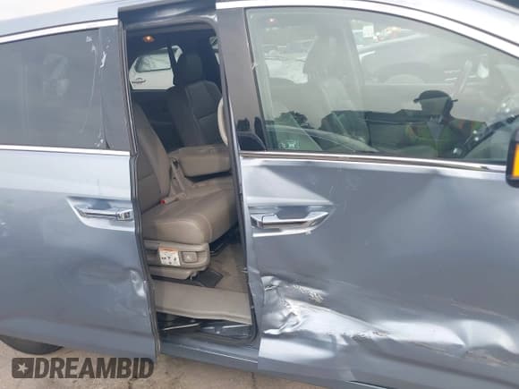 ✅ 2012 Honda Odyssey Touring • VIN: 5FNRL5H90CB126640 • Lot: 43287795. Listed on IAAI with 185,534 mi. Free auction sales archive from the USA and detailed vehicle history report at DreamBid. Image 6.