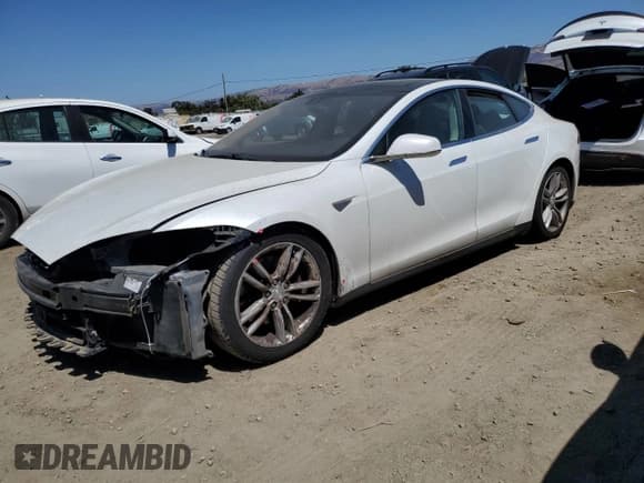 ✅ 2014 Tesla Model S 60 • VIN: 5YJSA1H11EFP57345 • Lot: 70719985. Listed on Copart with 149,484 mi. Free auction sales archive from the USA and detailed vehicle history report at DreamBid. Image 1.