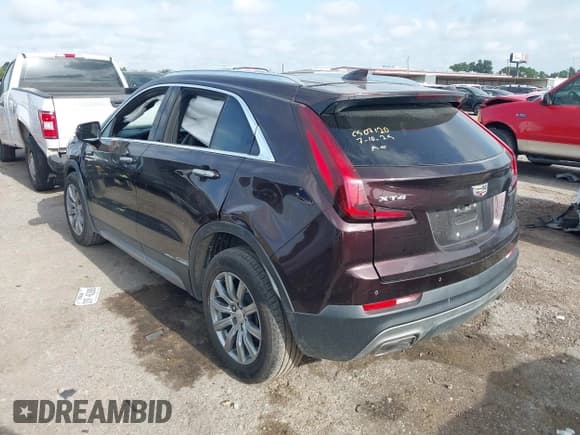 ✅ 2021 Cadillac XT4 FWD Premium Luxury • VIN: 1GYFZCR48MF002387 • Лот: 42752132. Опубликован ранее на IAAI с пробегом 106 859 миль. Бесплатный доступ к архиву аукционных продаж из США и подробный отчёт об истории автомобиля на DreamBid. Изображение 3.