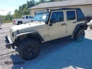 ✅ 2011 Jeep Wrangler Unlimited Sport • VIN: 1J4HA3H1XBL563793 • Lot: 43297255. Listed on IAAI with 118,518 mi. Free auction sales archive from the USA and detailed vehicle history report at DreamBid. Image 2.