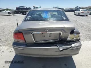 ✅ 2003 Hyundai Sonata GLS • VIN: KMHWF35H33A868884 • Lot: 61442535. Listed on Copart with 129,900 mi. Free auction sales archive from the USA and detailed vehicle history report at DreamBid. Image 6.