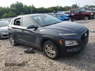 2019 Hyundai Kona SE z VIN KM8K12AA0KU276162, wystawiony jako Copart lot #56684113 z przebiegiem 88 112 mil mil oraz . Historia ofert i sprzedaży dostępna na DreamBid. Obrazek 4.