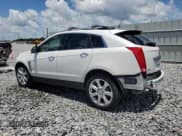 ✅ 2013 Cadillac SRX Performance Collection • VIN: 3GYFNDE38DS631335 • Lot: 60399855. Listed on Copart with 69,395 mi. Free auction sales archive from the USA and detailed vehicle history report at DreamBid. Image 2.