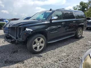 2018 Chevrolet Suburban Premier z VIN 1GNSKJKC0JR251055, wystawiony jako Copart lot #69452525 z przebiegiem 124 114 mil mil oraz Szkoda całkowita • Salvage title. Historia ofert i sprzedaży dostępna na DreamBid. Obrazek 1.