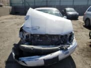 ✅ 2001 Lincoln Continental • VIN: 1LNHM97V31Y673523 • Lot: 52451385. Listed on Copart with 133,879 mi. Free auction sales archive from the USA and detailed vehicle history report at DreamBid. Image 5.