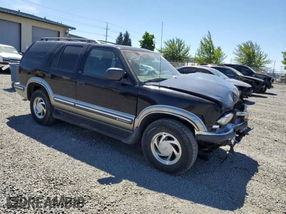 1999 Chevrolet Blazer LT с VIN 1GNDT13W4X2248675, выставлен на аукционе Copart как лот 59103635 с пробегом 105 827 миль миль и Списание • Salvage title. История ставок и продаж доступна на DreamBid. Изображение 4.