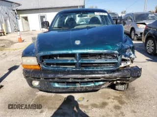 ✅ 1998 Dodge Dakota SLT • VIN: 1B7GL22X6WS661346 • Lot: 77401914. Wystawiony na Copart z przebiegiem 214 497 mil. Bezpłatny archiwum sprzedaży aukcyjnych z USA i szczegółowy raport historii pojazdu na DreamBid. Zdjęcie 5.