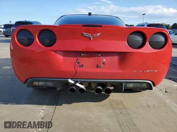 2005 Chevrolet Corvette with VIN 1G1YY24U055117293, listed as a Copart auction lot 74013514 with Not provided miles and Salvage title. Bid and sale history available at DreamBid. Image 6.
