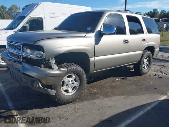 2001 Chevrolet Tahoe LT z VIN 1GNEK13T01R199325, wystawiony jako IAAI lot #43351865 z przebiegiem 252 632 mil mil oraz . Historia ofert i sprzedaży dostępna na DreamBid. Obrazek 2.