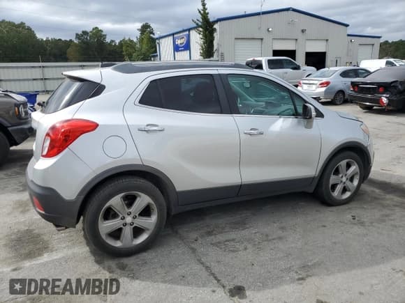 ✅ 2015 Buick Encore • VIN: KL4CJASBXFB198026 • Lot: 90265435. Listed on Copart with 90,811 mi. Free auction sales archive from the USA and detailed vehicle history report at DreamBid. Image 3.