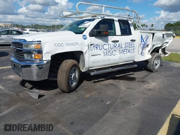 ✅ 2015 Chevrolet Silverado 2500HD Work Truck • VIN: 1GB2CUEGXFZ511799 • Лот: 43329692. Опубликован ранее на IAAI с пробегом 74 004 миль. Бесплатный доступ к архиву аукционных продаж из США и подробный отчёт об истории автомобиля на DreamBid. Изображение 2.