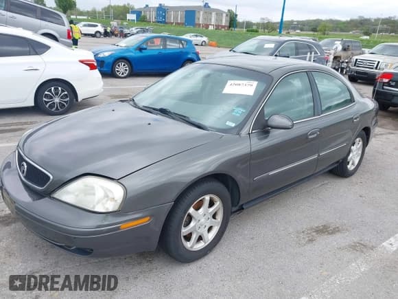 ✅ 2002 Mercury Sable GS • VIN: 1MEFM50U02G614697 • Lot: 42087379. Listed on IAAI with 90,209 mi. Free auction sales archive from the USA and detailed vehicle history report at DreamBid. Image 2.