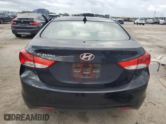 2013 Hyundai Elantra GLS z VIN KMHDH4AE9DU879388, wystawiony jako Copart lot #85315495 z przebiegiem 122 355 mil mil oraz Szkoda całkowita • Salvage title. Historia ofert i sprzedaży dostępna na DreamBid. Obrazek 6.