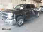 2016 Chevrolet Silverado 1500 LT with VIN 3GCUKREC6GG129840, listed as a IAAI auction lot 43088052 with 123,184 mi miles and . Bid and sale history available at DreamBid. Image 18.