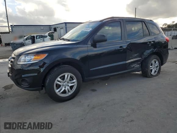 ✅ 2012 Hyundai Santa Fe GLS • VIN: 5XYZG3AB8CG169329 • Lot: 85384604. Listed on Copart with 77,494 mi. Free auction sales archive from the USA and detailed vehicle history report at DreamBid. Image 1.