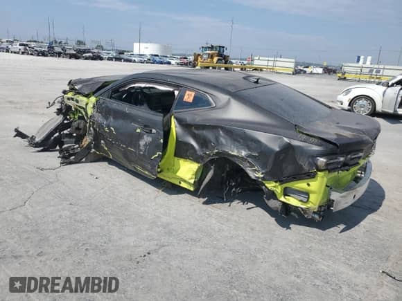 2021 Chevrolet Camaro 1LT с VIN 1G1FB1RS2M0115633, выставлен на аукционе Copart как лот 82183495 с пробегом Не указан миль и Списание • Salvage title. История ставок и продаж доступна на DreamBid. Изображение 2.