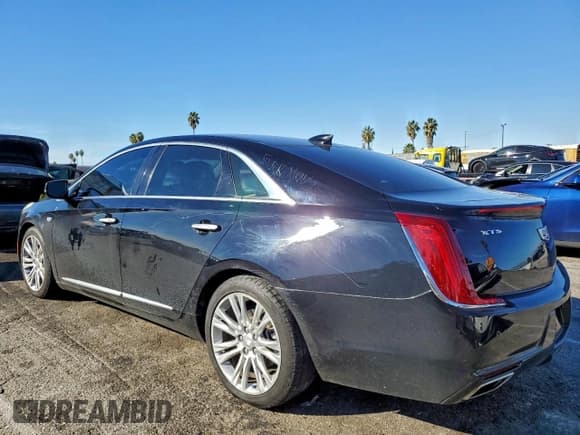 ✅ 2018 Cadillac XTS Luxury • VIN: 2G61M5S38J9143270 • Lot: 94731875. Listed on Copart with 116,745 mi. Free auction sales archive from the USA and detailed vehicle history report at DreamBid. Image 2.