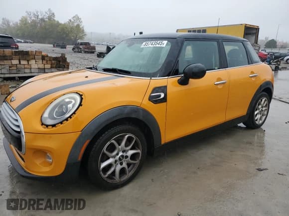 ✅ 2015 MINI Hardtop 4 Door • VIN: WMWXS5C56FT827910 • Lot: 85743545. Listed on Copart with 125,009 mi. Free auction sales archive from the USA and detailed vehicle history report at DreamBid. Image 1.