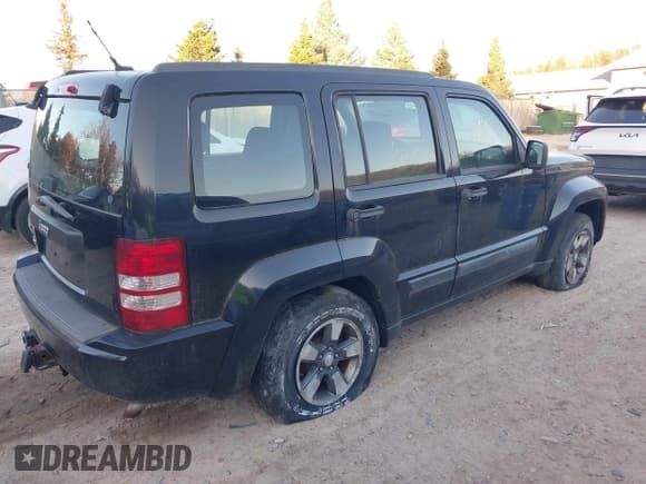 ✅ 2009 Jeep Liberty Sport • VIN: 1J8GN28K69W502256 • Lot: 43692177. Listed on IAAI with 99,173 mi. Free auction sales archive from the USA and detailed vehicle history report at DreamBid. Image 4.