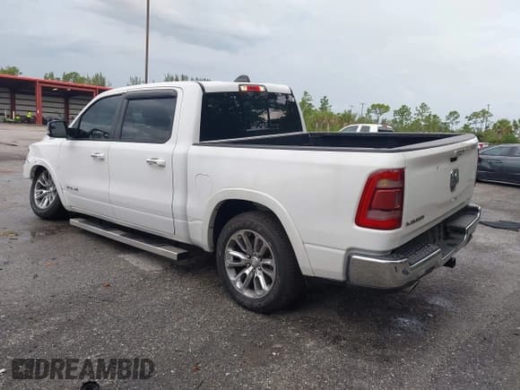 ✅ 2021 Ram 1500 Laramie • VIN: 1C6RREJT5MN628655 • Lot: 42734346. Listed on IAAI with 104,116 mi. Free auction sales archive from the USA and detailed vehicle history report at DreamBid. Image 3.