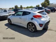 ✅ 2013 Hyundai Veloster Turbo • VIN: KMHTC6AE6DU109817 • Lot: 69486334. Wystawiony na Copart z przebiegiem 105 509 mil. Bezpłatny archiwum sprzedaży aukcyjnych z USA i szczegółowy raport historii pojazdu na DreamBid. Zdjęcie 2.