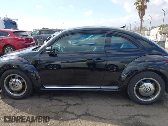 ✅ 2013 Volkswagen Beetle Fender Edition • VIN: 3VWJP7ATXDM622350 • Lot: 41503396. Listed on IAAI with 55,468 mi. Free auction sales archive from the USA and detailed vehicle history report at DreamBid. Image 14.