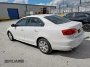 ✅ 2013 Volkswagen Jetta SE • VIN: 3VWBX7AJ8DM430329 • Lot: 81820365. Listed on Copart with 125,159 mi. Free auction sales archive from the USA and detailed vehicle history report at DreamBid. Image 2.