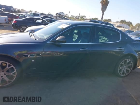 ✅ 2009 Maserati Quattroporte • VIN: ZAMJK39A890044705 • Lot: 41656441. Listed on IAAI with 131,776 mi. Free auction sales archive from the USA and detailed vehicle history report at DreamBid. Image 14.