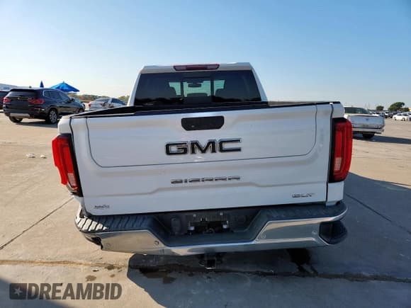 ✅ 2019 GMC Sierra 1500 SLT • VIN: 3GTP8DED7KG293646 • Лот: 84594535. Опубликован ранее на Copart с пробегом 98 507 миль. Бесплатный доступ к архиву аукционных продаж из США и подробный отчёт об истории автомобиля на DreamBid. Изображение 6.