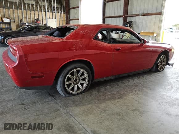 ✅ 2012 Dodge Challenger SXT • VIN: 2C3CDYAG9CH291291 • Lot: 73776384. Wystawiony na Copart z przebiegiem 139 441 mil. Bezpłatny archiwum sprzedaży aukcyjnych z USA i szczegółowy raport historii pojazdu na DreamBid. Zdjęcie 3.