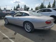 ✅ 2001 Jaguar XK • VIN: SAJDA41C01NA21437 • Lot: 78458894. Listed on Copart with 61,197 mi. Free auction sales archive from the USA and detailed vehicle history report at DreamBid. Image 2.