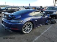 ✅ 2022 Porsche 718 Cayman GT4 • VIN: WP0AC2A82NS275540 • Лот: 87511515. Опубликован ранее на Copart с пробегом 30 300 миль. Бесплатный доступ к архиву аукционных продаж из США и подробный отчёт об истории автомобиля на DreamBid. Изображение 3.