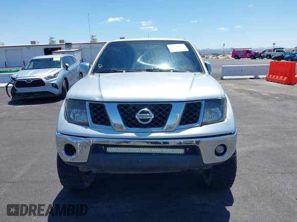 ✅ 2007 Nissan Frontier SE • VIN: 1N6AD06U97C401619 • Lot: 42674254. Listed on IAAI with 245,605 mi. Free auction sales archive from the USA and detailed vehicle history report at DreamBid. Image 6.