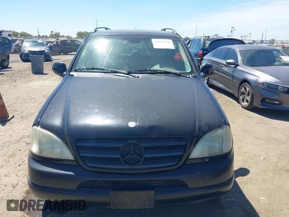✅ 2000 Mercedes-Benz M 320/430/500 • VIN: 4JGAB72E3YA201747 • Lot: 42942349. Wystawiony na IAAI z przebiegiem 257 856 mil. Bezpłatny archiwum sprzedaży aukcyjnych z USA i szczegółowy raport historii pojazdu na DreamBid. Zdjęcie 6.